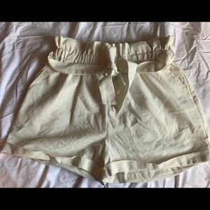 Cream colored, shorts